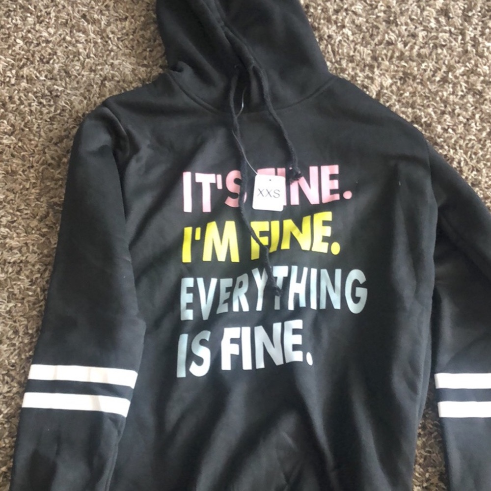sweatshirt never worn still has the tag on it.